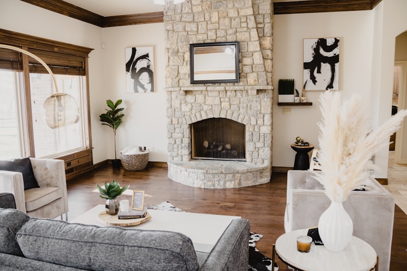 Staged living room with stone fireplace