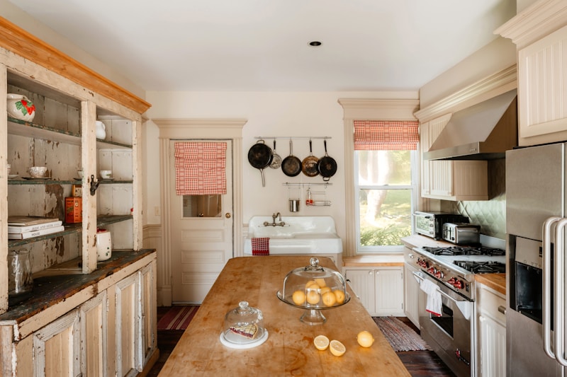Farmhouse kitchen with vintage hutch and lemons